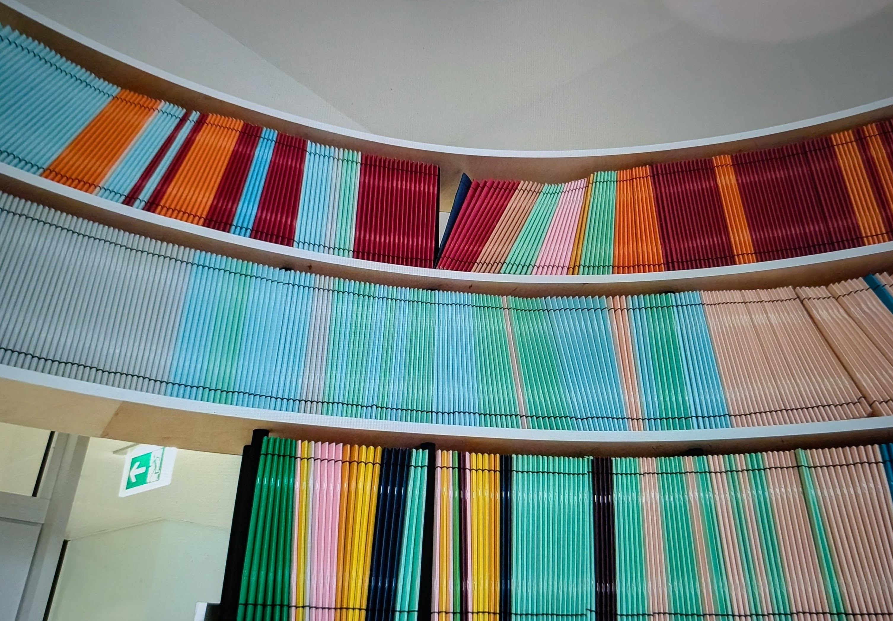 Time capsule with dark blue notebook, carefully placed for future recovery.